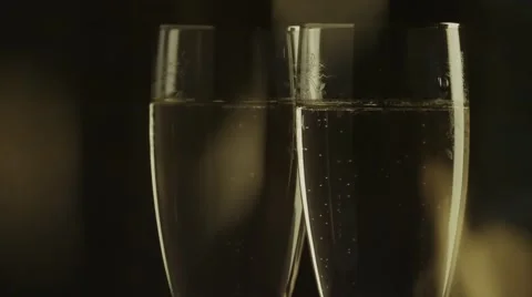 A pair of flutes of champagne with bubbles Stock Footage 56637655