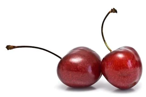 A pair of fresh cherries. Stock Photos