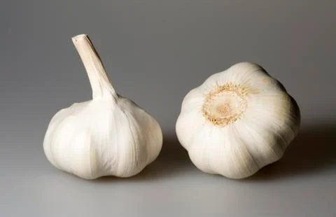 Pair of Garlic Bulbs Stock Photos