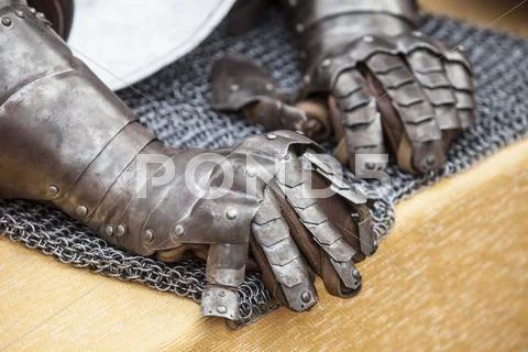 Pair of gauntlets for an armour medieval Stock Photos