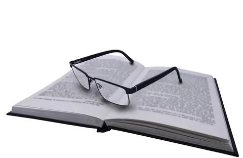 Pair of Glasses on Book Stock Photos
