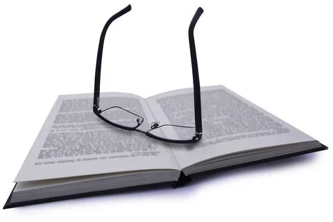 Pair of Glasses on Book Stock Photos
