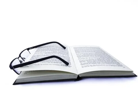 Pair of Glasses on Book Foto stock