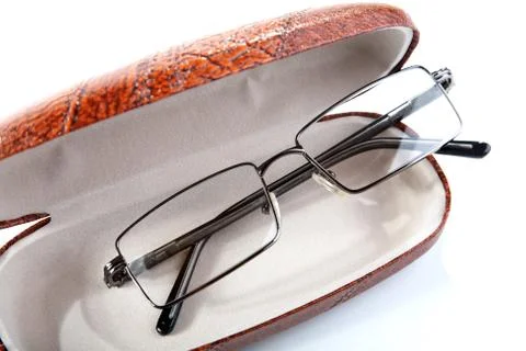 Pair of glasses in a case Stock Photos