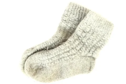 Pair of gray knit wool socks isolated on white Stock Photos