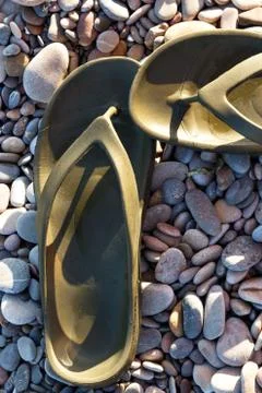Pair of green flip flops. Stock Photos