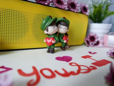 A pair of green-robed couples Stock Photos