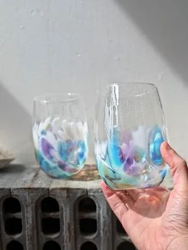 Pair of Hand Blown Multicolor Stemless Glasses, Purple Blue Pastel Colors Stock Photos