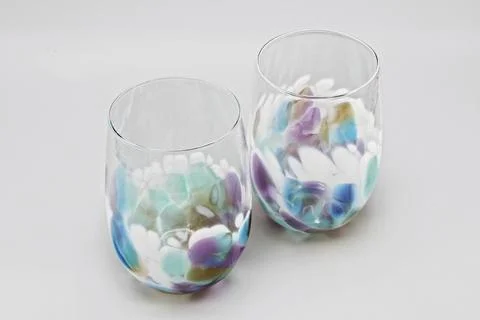 Pair of Hand Blown Multicolor Stemless Glasses, Purple Blue Pastel Colors Stock Photos