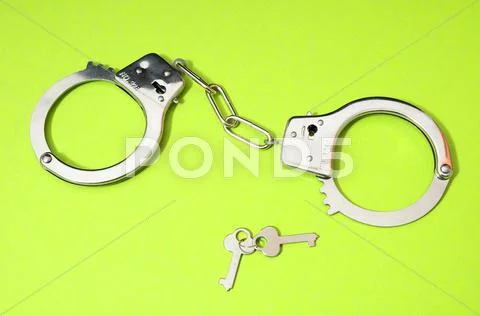 Pair of handcuffs Stock Photos