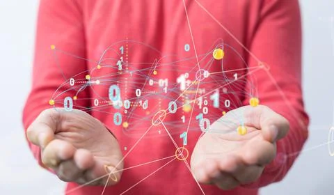 Pair of hands holding a network of binary code Stockfoto's