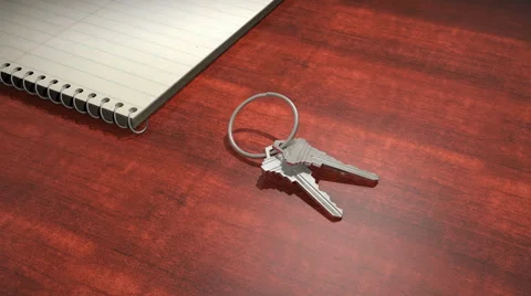 A pair of house keys on a desk Stock Footage 54146910