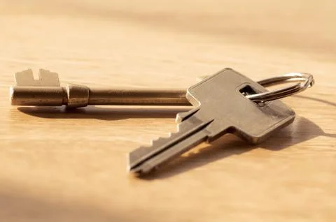 Pair of keys on the table close up Foto stock