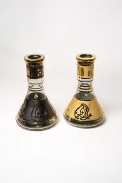 Pair of Khalil Maamoon glass hookah bases on white Foto stock