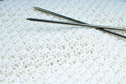 Pair of knitting needles isolated over white. Sweater or scarf White Crochete Stock Photos