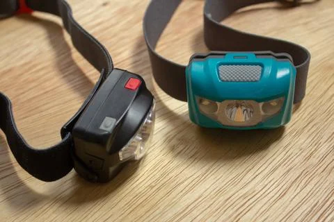 A pair of LED headlamps, of two different brands Stock-Fotos