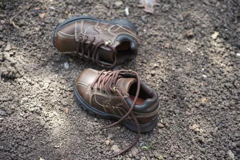 A pair of lost shoes Stock Photos