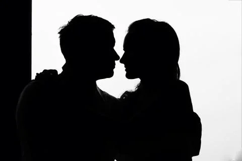 Pair of lovers in the backlight Stock Photos