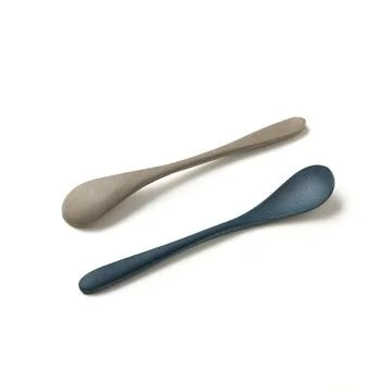 Pair of modern spoons Stock Photos