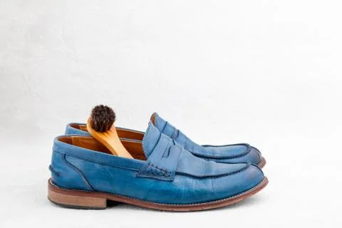 Pair of nice leather blue discarded boots with laces Foto stock
