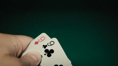 A pair of nines in a hand on the table. Pocker Stockbeeldmateriaal 65379259