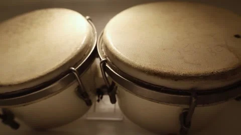 A Pair of Old Bongo Drums With Leather Drumheads Stock Footage 260334860