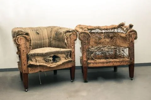 Pair old broken abandoned sofa Stock Photos
