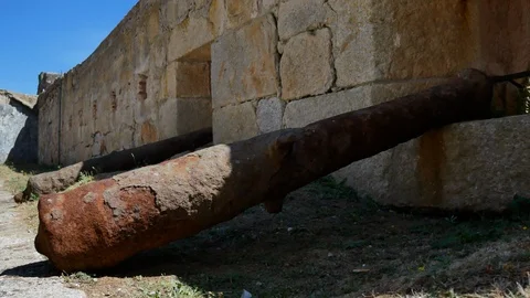 Pair of old rusty cannon in 16th Century Fort, Porto, Portugal Stock Footage 95156204