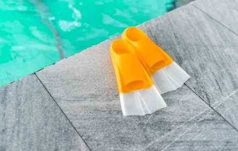 A pair of orange flippers Stock Photos