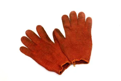 Pair of orange-red working knitted gloves, turned inside out. Stretchy oran.. Stock Photos