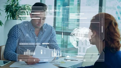 Pair picking up reports in business HUD graphs animating while manager Stock Footage 335762170