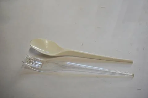 A pair of Plastic Spoon and Fork on the White background 2 Foto stock