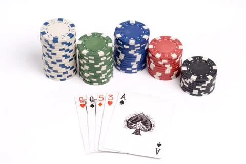 A pair Queens hand with colored poker chips. 写真素材