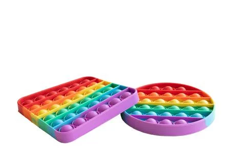 Pair of rainbow colored poppets Stock Photos