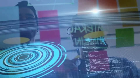 Pair reaching and pointing at glass, blue HUD aligning sticky notes and code, Stock Footage 333351319