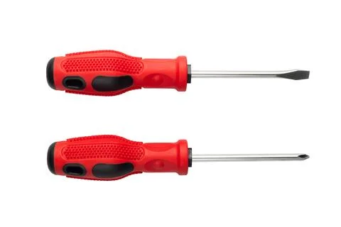 Pair of red and black screwdrivers isolated on white background Stock Photos