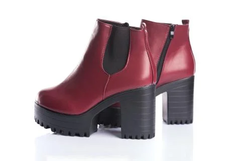 Pair of red boots for spring or autumn wear Foto stock