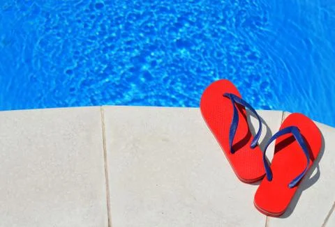 Pair of red flip-flops Stock Photos