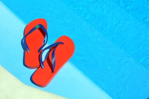 Pair of red flip-flops Foto stock
