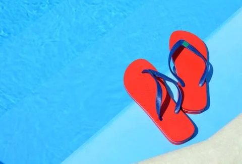 Pair of red flip-flops. Stock Photos