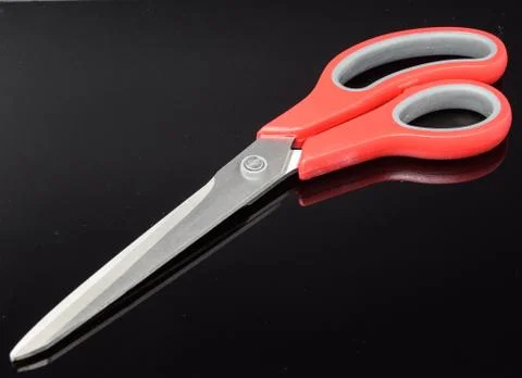 A pair of Red handled scissors Stock Photos