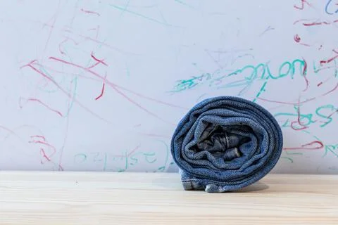 A pair of rolled jeans Stock Photos