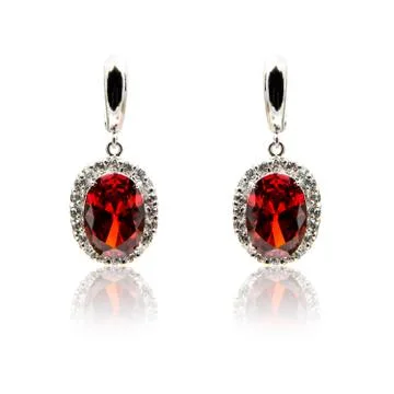 Pair of ruby diamond earrings isolated on white Stock Photos