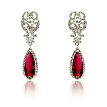 Pair of ruby diamond earrings isolated on white Stock Photos