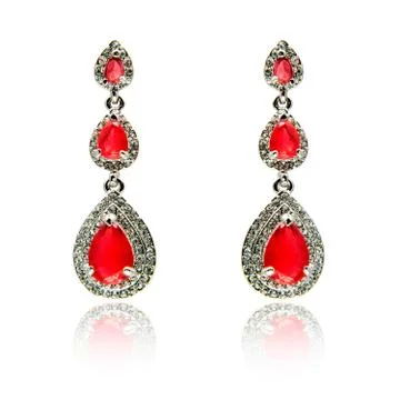 Pair of ruby diamond earrings isolated on white Stock Photos