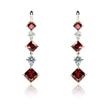 Pair of ruby diamond earrings isolated on white Stock Photos