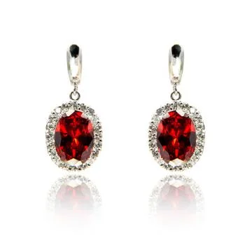 Pair of ruby diamond earrings isolated on white Stock-Fotos