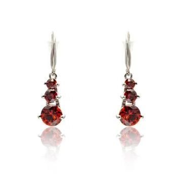 Pair of ruby diamond earrings isolated on white Stock Photos