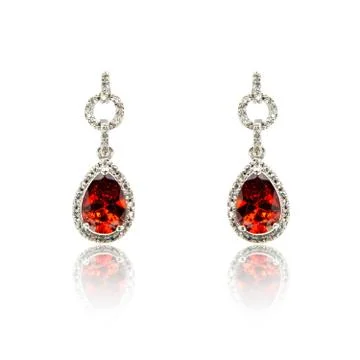 Pair of ruby diamond earrings isolated on white Stock Photos