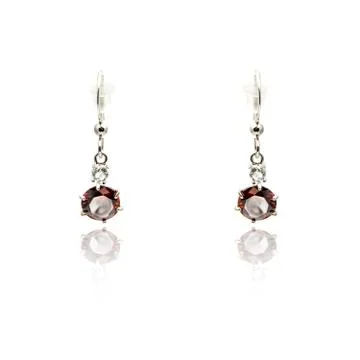 Pair of ruby diamond earrings isolated on white Stock Photos